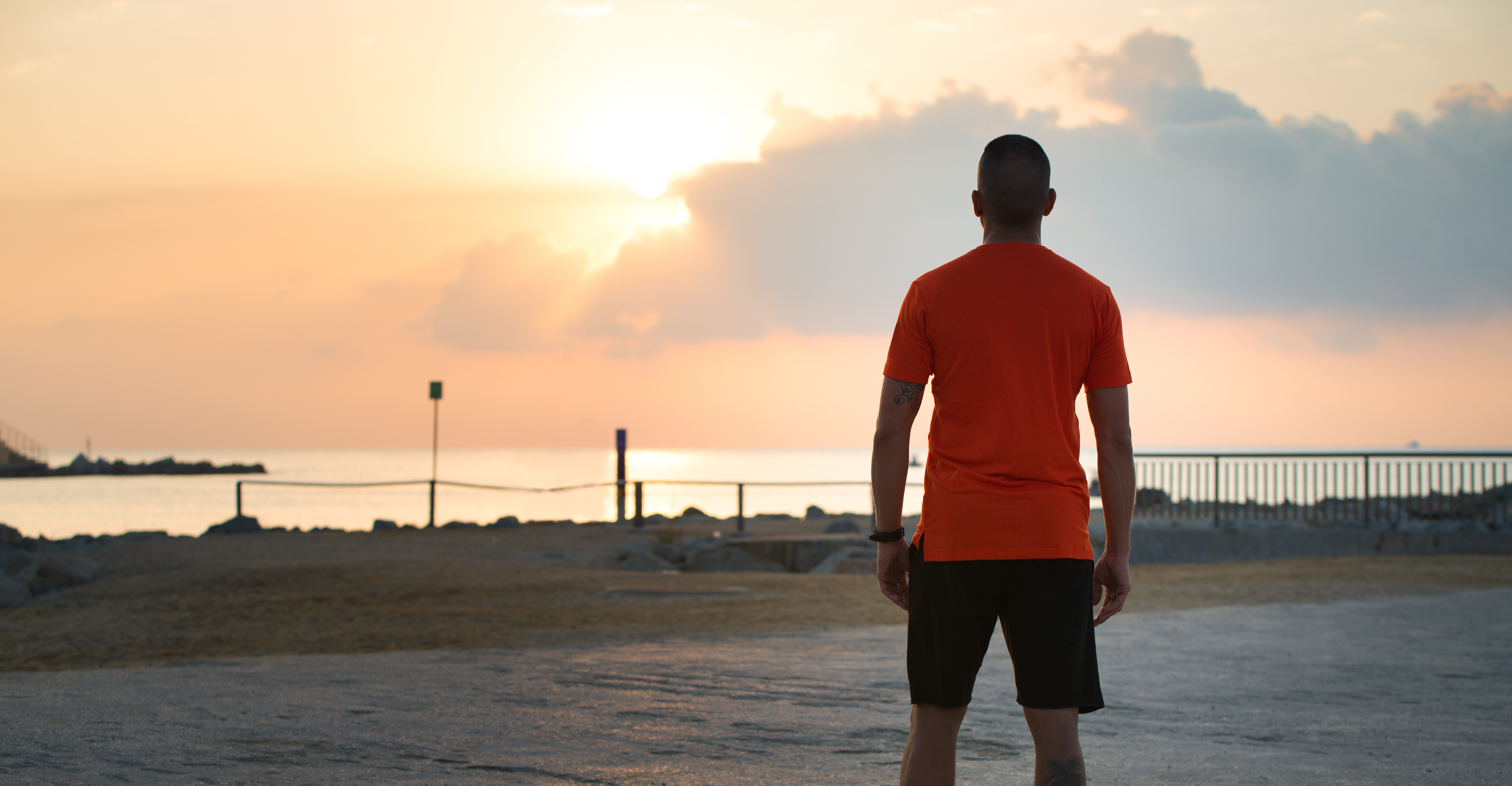 person walking slowly outside looking calm and relaxed not in sportswear